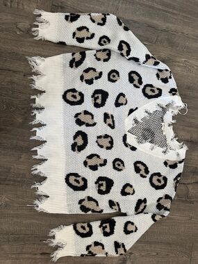 Cheetah print distressed sweater